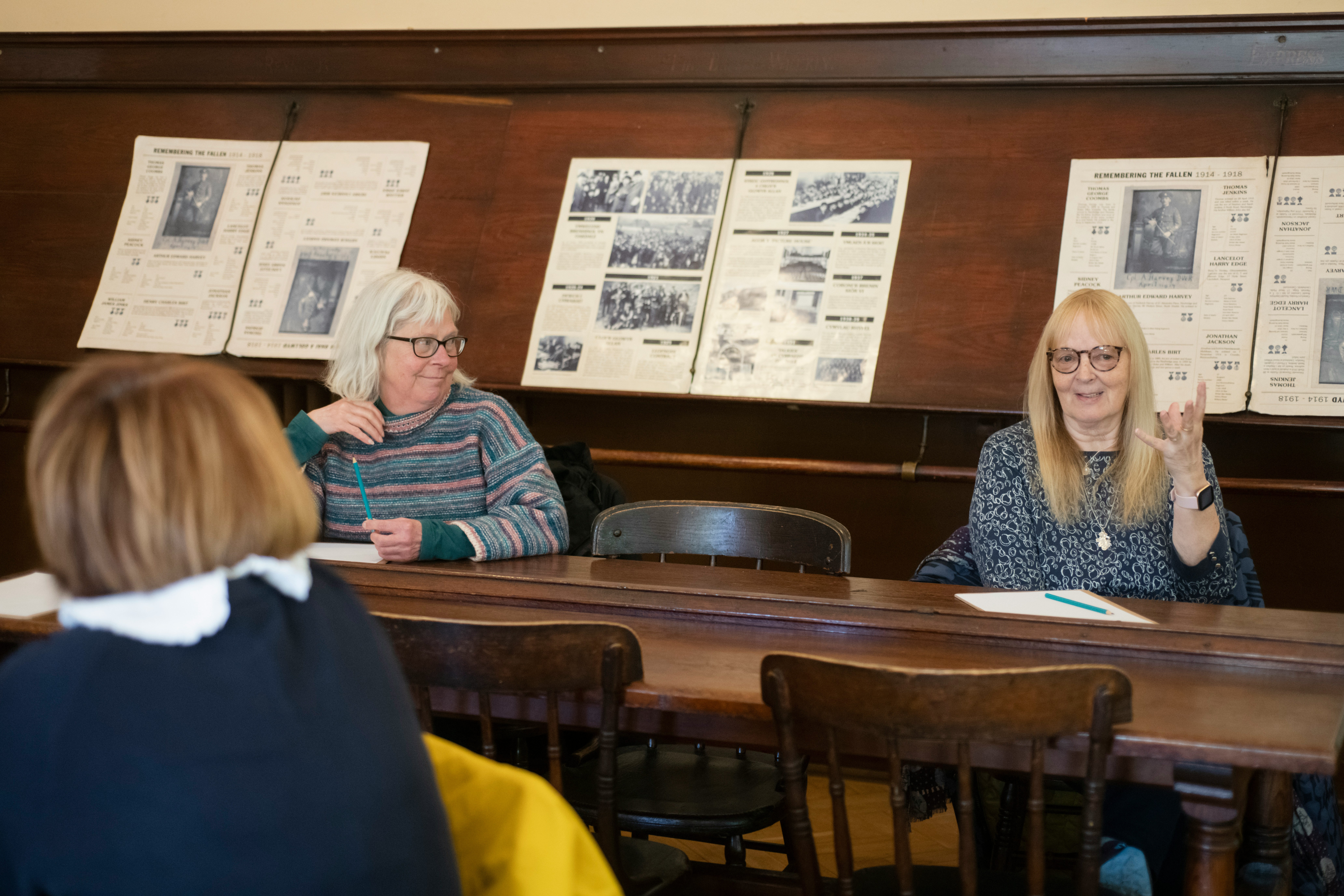 A group of women sitting at a table